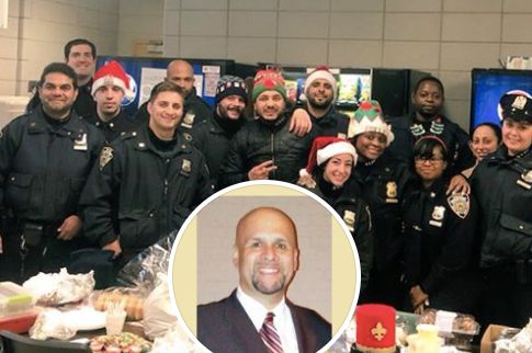 Robert Berrios's Facebook page shows his photo in front of a group of NYPD officers smiling for the camera.